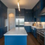 blue kitchen with dark cabinets